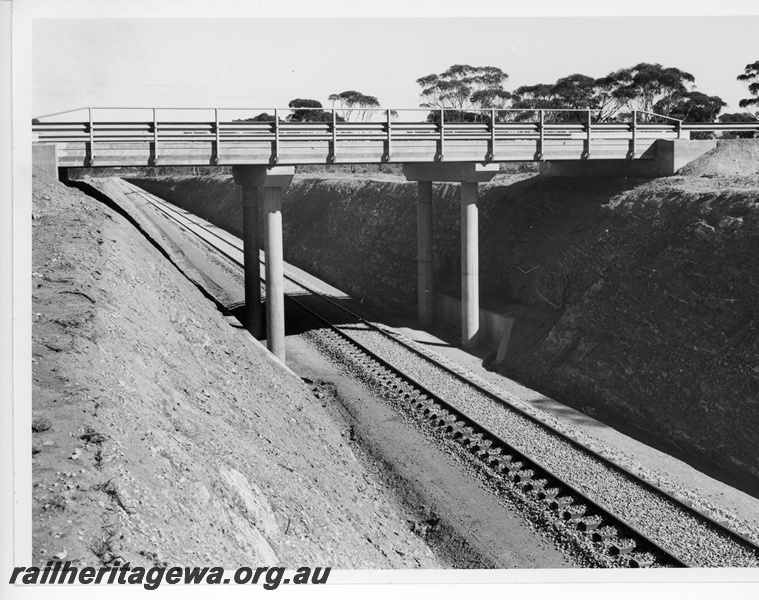 P10658
Overpass, concrete and steel, track in cutting, Kalgoorlie to Kambalda line, view from top of cutting looking down onto track
