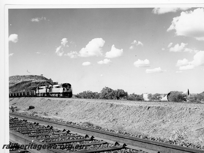 P10909
Cliffs Robe River (CRRIA) M636 class 1712, 1710 crossing Western Creek deviation following cyclone damage to track in February 1973.
