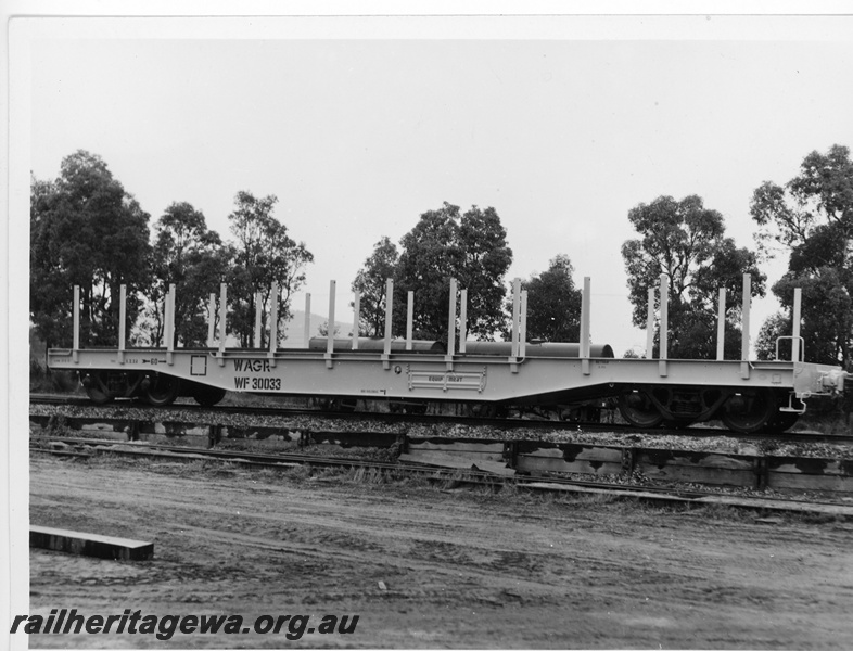 P10970
WF class 30033 bogie flat wagon with bolsters, side and end view
