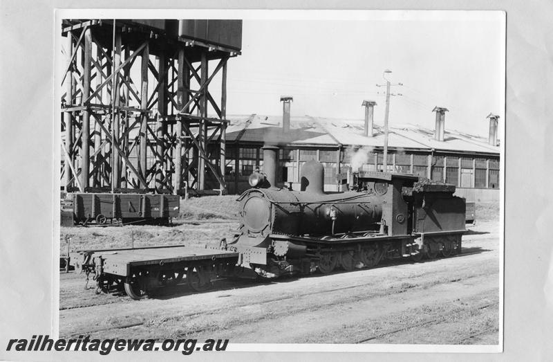 P11010
G class 48, I class 458 shunters float, roundhouse, water towers, Bunbury yard, shunting, part view of a five plank RA class open bogie wagon in the background.
