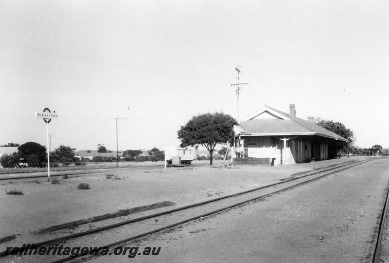 P11030
Station nameboard, station building, Wyalkatchem, GM line, view looking down track towards the building.
