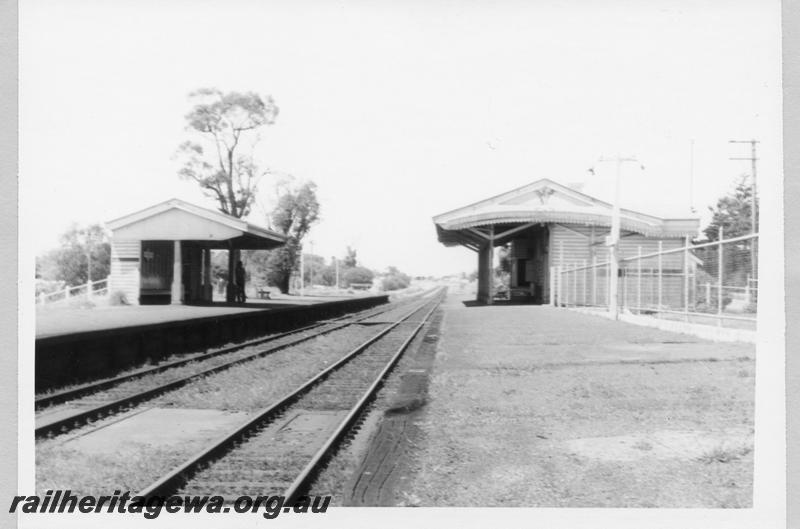 P11037
Station buildings, Karrakatta, view down track shows buildings on both platforms.
