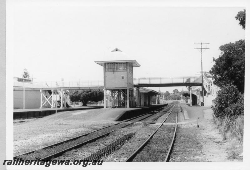 P11039
Signal box, footbridge, station buildings,goods shed, Claremont, view along the track looking towards Perth
