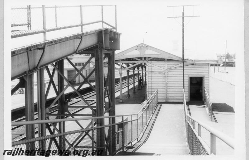 P11045
Footbridge, station buildings, Cottesloe, view from footbridge showing the end of the main station building.
