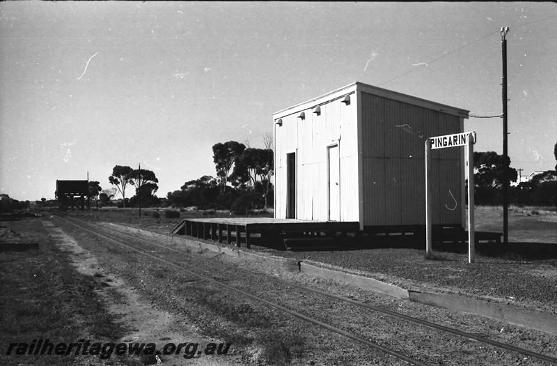 P11198
Station building, platform, water tower in distant, Pingaring, LH line, view along the track.
