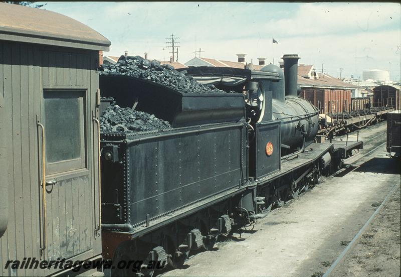 P11243
G class 123, brakevan and shunters float, in yard, Bunbury. SWR line.
