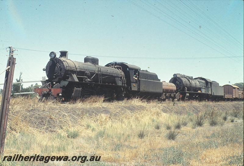 P11311
W class 960 with travelling water tank, S class on goods train. BN line.
