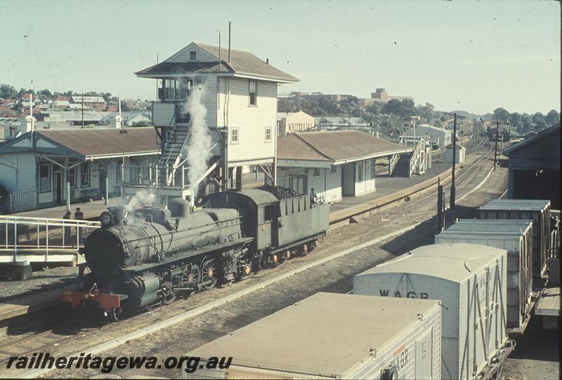 P11377
PMR class 731, station building, platforms, signal box, footbridge, part of goods shed, WAGR containers including a furniture container, Subiaco. ER line.
