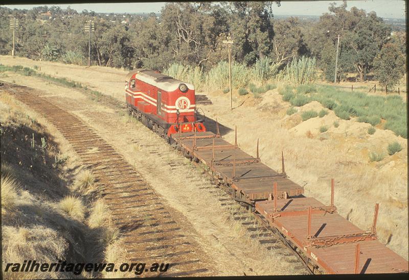 P11388
F class 43, pushing work train, old up line dismantled, east of Swan View. ER line.
