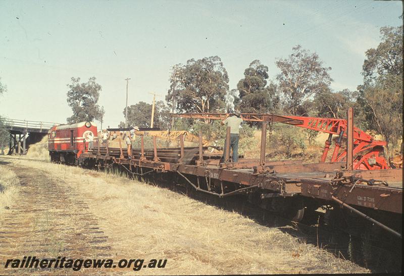 P11389
F class 43, loading rail onto work train, Morrison Rd overbridge in background. ER line.
