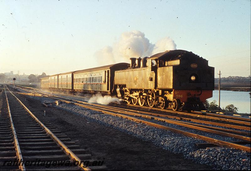 P11432
DD class 596, down suburban passenger, new track being built on left, Rivervale bank. SWR line.
