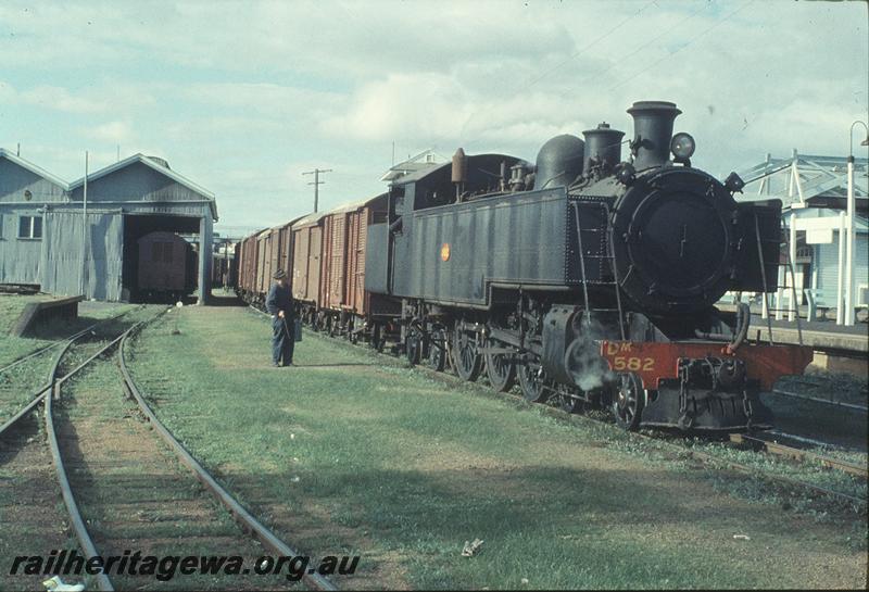 P11569
DM class 582, footbridge, goods shed, loading ramp, shunting Subiaco goods yard. ER line.
