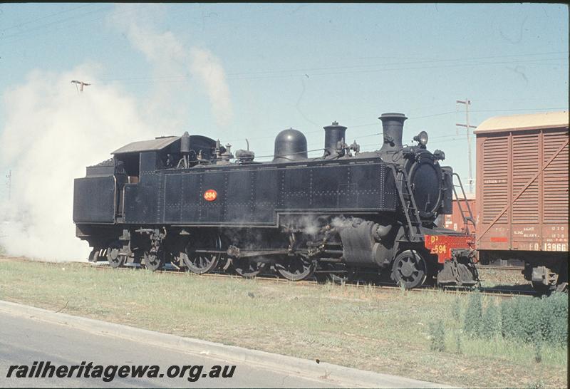 P11639
DD class 594 coupled to FD class 13866 with cross bracing and a yellow roof, blowing down boiler.
