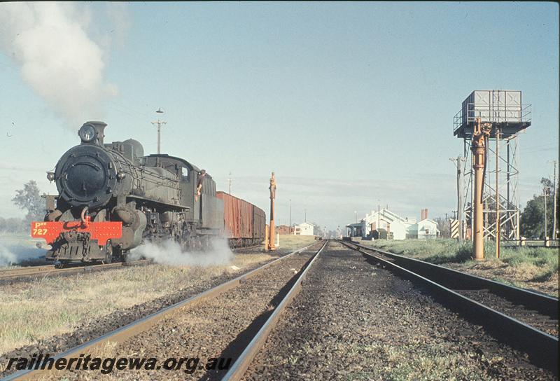 P11649
PMR class 727, water columns, platform, station building, up goods, water tower, departing back platform. SWR line.
