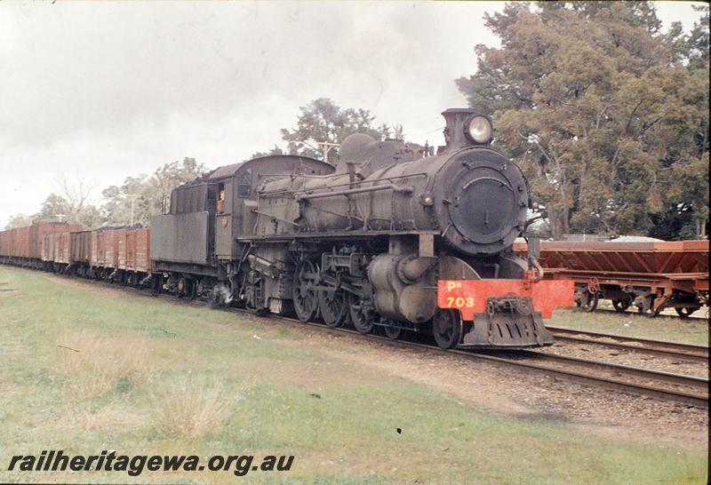 P11669
PM class 703, up goods, on main line, ballast in siding, Mundijong. SWR line.
