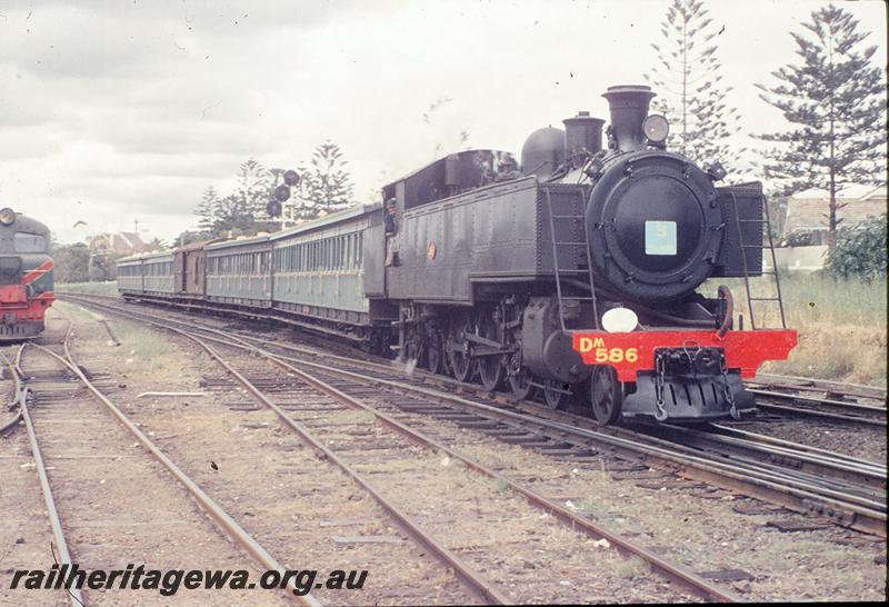 P11691
DM class 586, show special, crossing over to back platform, XA class in loco siding, Claremont. ER line.
