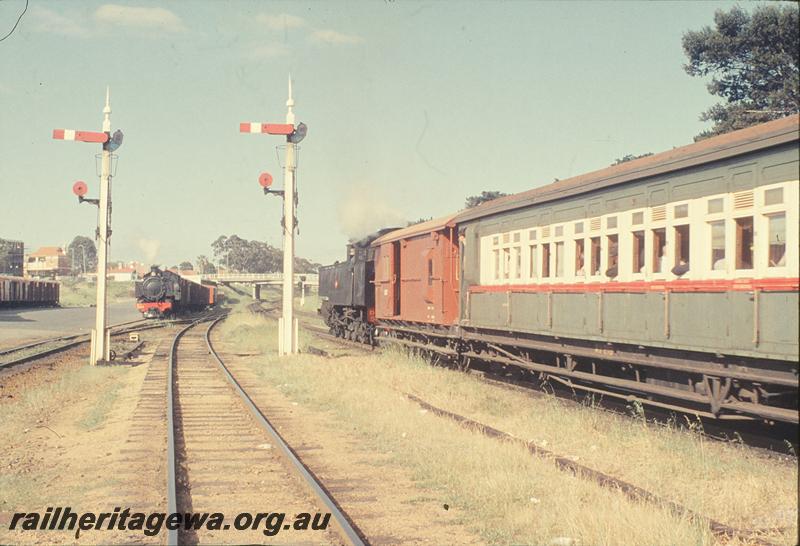 P11713
DD class 599, down show special, signals, Axon Avenue bridge, DD class on shunt train in yard, Subiaco. ER line.
