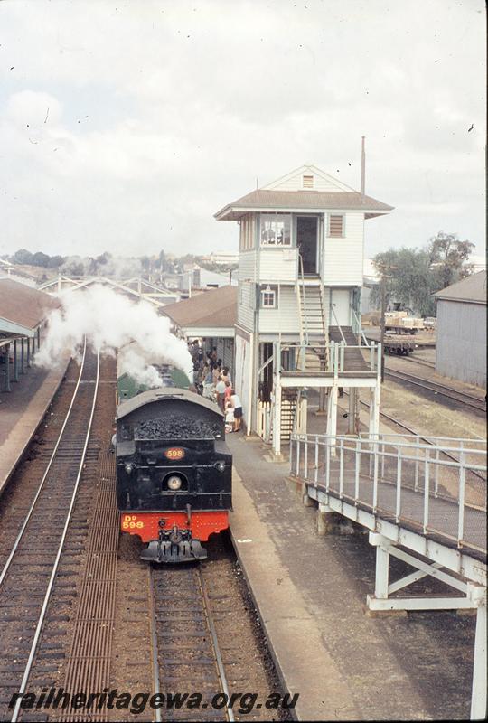 P11745
DD class 598, Down passenger, station buildings, platform, signal box, part of footbridge, goods shed, Subiaco. ER line.
