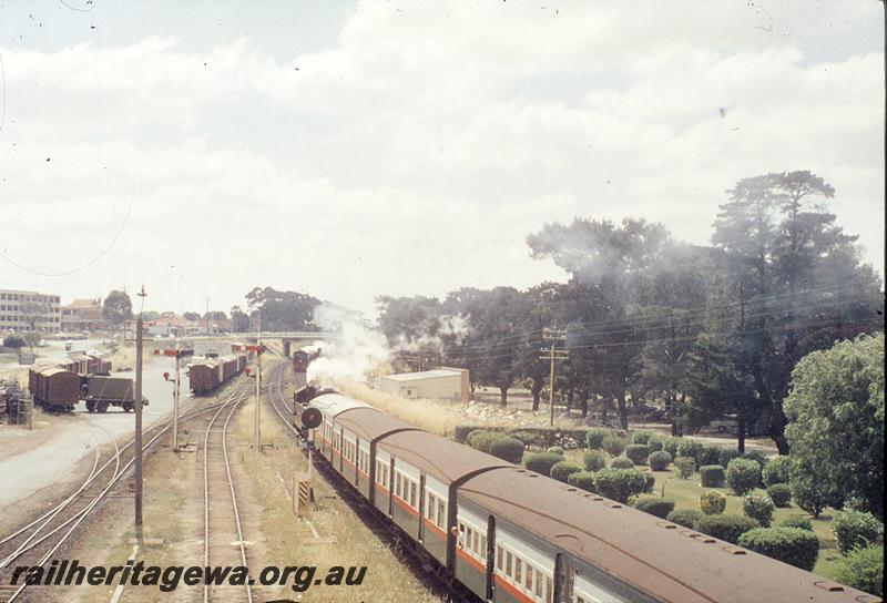 P11748
DD class 598, Down passenger, DD in distance on up passenger, east end of sidings, Subiaco. ER line.
