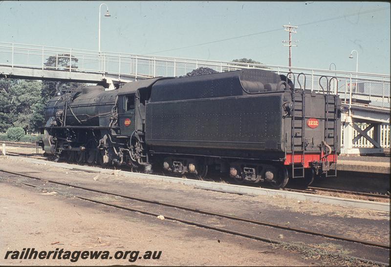 P11757
V class 1212, platform, footbridge, back platform road, Subiaco. ER line.
