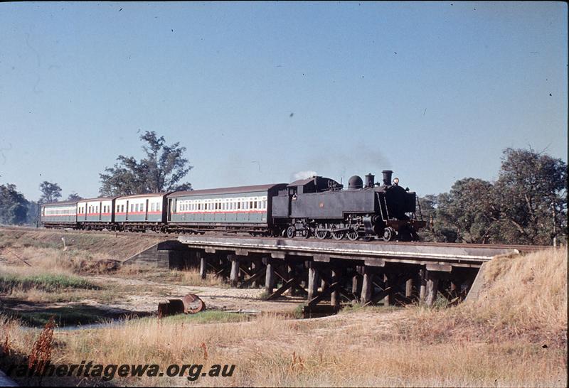 P11776
DD class 592, suburban passenger, Canning River bridge, approaching Gosnells. SWR line.
