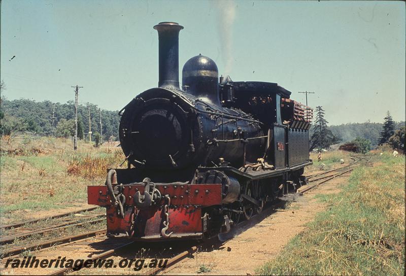 P11809
State Saw Mills loco SSM 7, running around train at interchange siding, front and side view, Pemberton. PP line.
