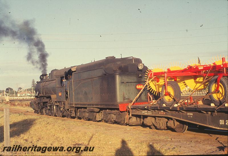 P11885
U class 655, side and rear view, shunting, hay rakes on  QU class wagon in the black livery. Unknown location.
