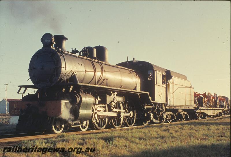 P11887
U class 655,front and side view, shunting, hay rakes on QU class wagon. Unknown location.
