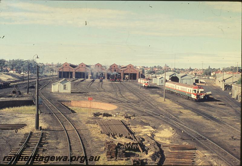 P11892
East Perth loco shed, Western facade, preparations for demolition. ER line.
