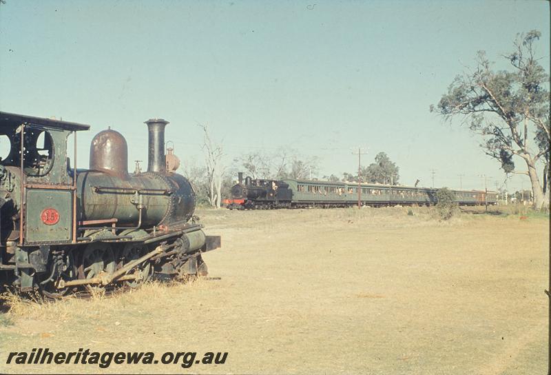 P11940
G class 123 on special train, passing A class 15 in park, South Bunbury. SWR line.
