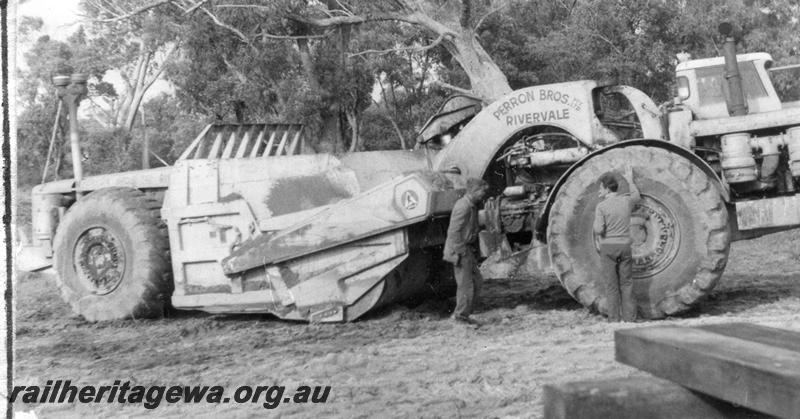 P12027
5 of 12 images of the construction of the Kwinana to Jarrahdale railway. (ref: The Railway Institute Magazine, July 1963).view of a scraper earth mover used in the construction of the line.
