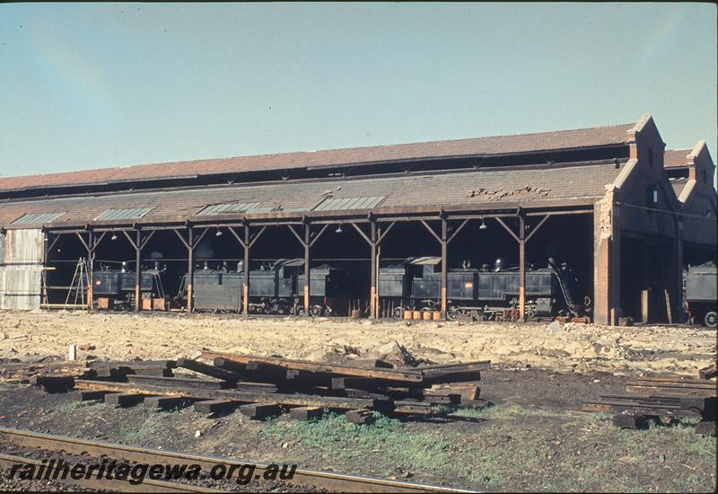 P12115
DM class, DD class, partially demolished sheds, East Perth loco shed. ER line.
