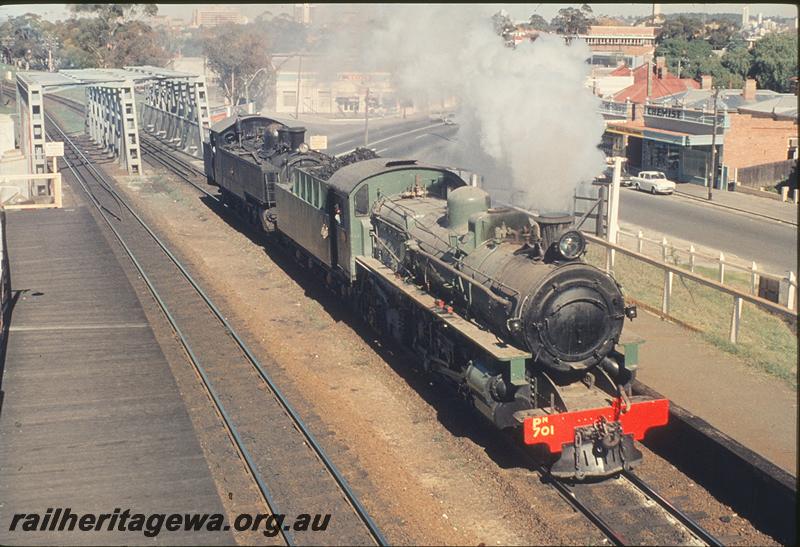 P12121
PM class 701, DD class 593, subway bridge, part of platform, Mount Lawley. Delivery of DD to old Northam loco. ER line.
