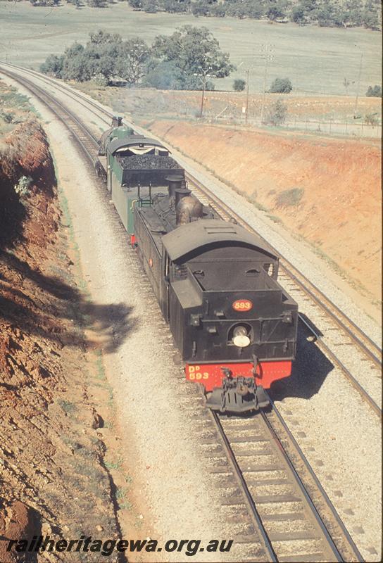 P12125
PM class 701, DD class 593, near site of H crossing, Toodyay. Delivery of DD to old Northam loco. Avon Valley line.
