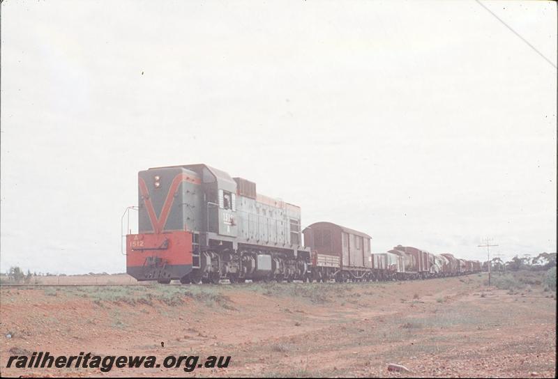 P12153
A class 1512, up freight, north of Tilley. EM line.
