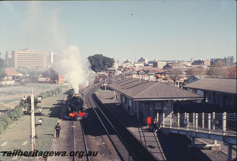 P12198
V class 1204, 37 goods departing East Perth, station buildings, platform. SWR line.
