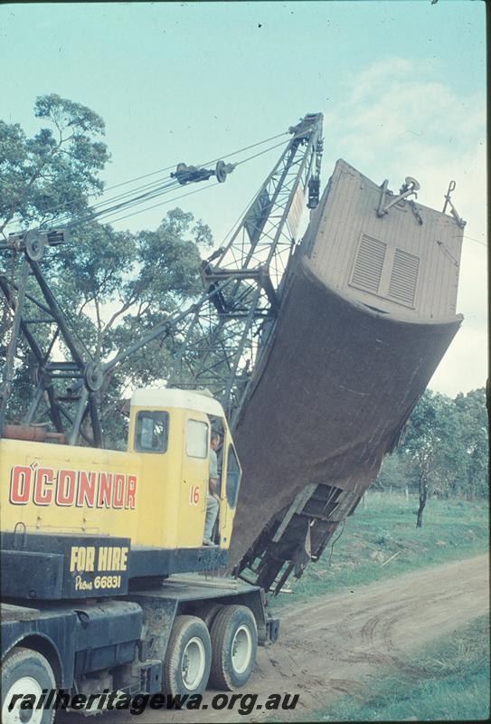 P12227
Lifting remains of VA class 10126 bogie van, Gingin accident. MR line.
