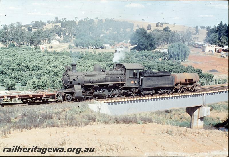 P12416
F class 423, pushing ballast across steel girder bridge, Balingup. PP line. Goods shed.
