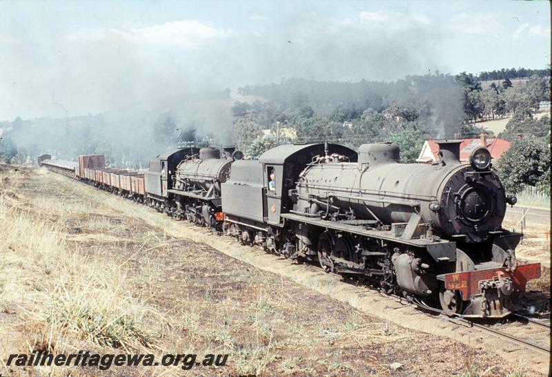 P12428
W class 922, W class 924, ballast train climbing bank north out of Bridgetown, PP line. Additional wagons for brake power.
