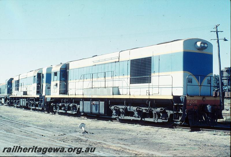 P12459
AB class 1533, on SG transfer bogies, being shunted into Midland Workshops by K class 204, K class 206. Loco coaling plant in background.
