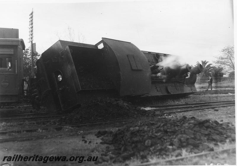 P12620
DM class 585, derailed and lying on its side, end and side view
