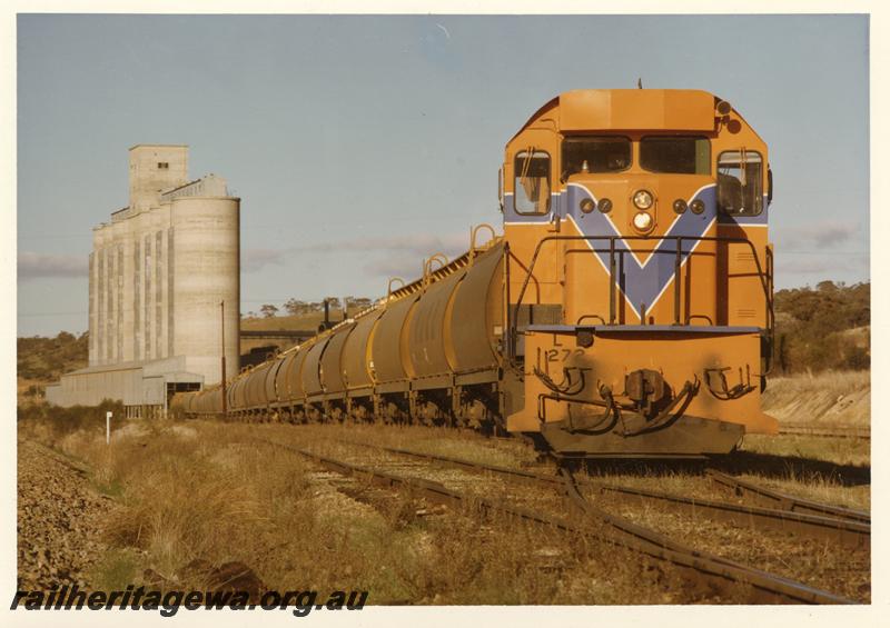 P12622
L class 272 in Westrail orange livery, grain train being loaded at Avon Yard, front view of loco

