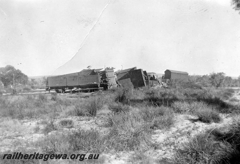 P12649
5 of 7 views of the derailment at Millendon on the 22nd December 1944, MR line, views shows derailed wagons including an upright MRWA AC class wagon
