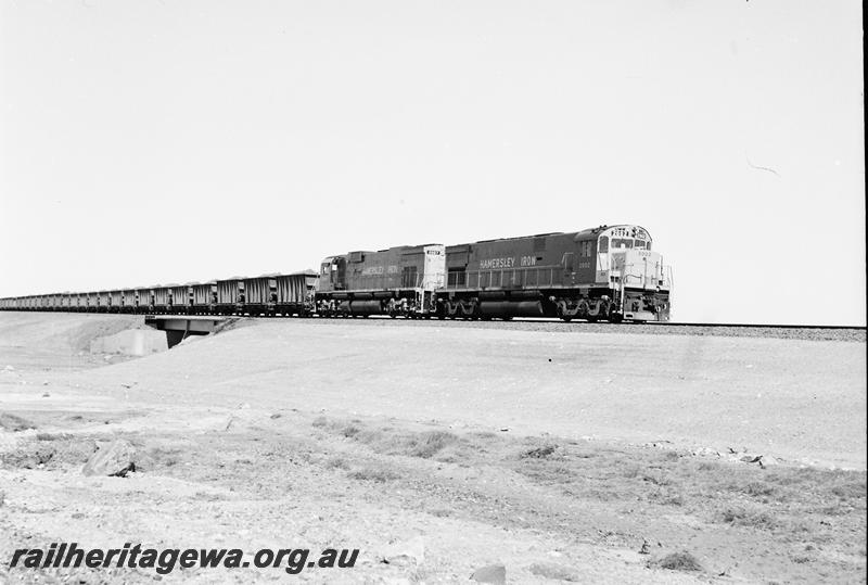 P12675
Hamersley Iron C628 class 2002 and C636 class 2007, later renumbered to 3007, with a loaded ore train
