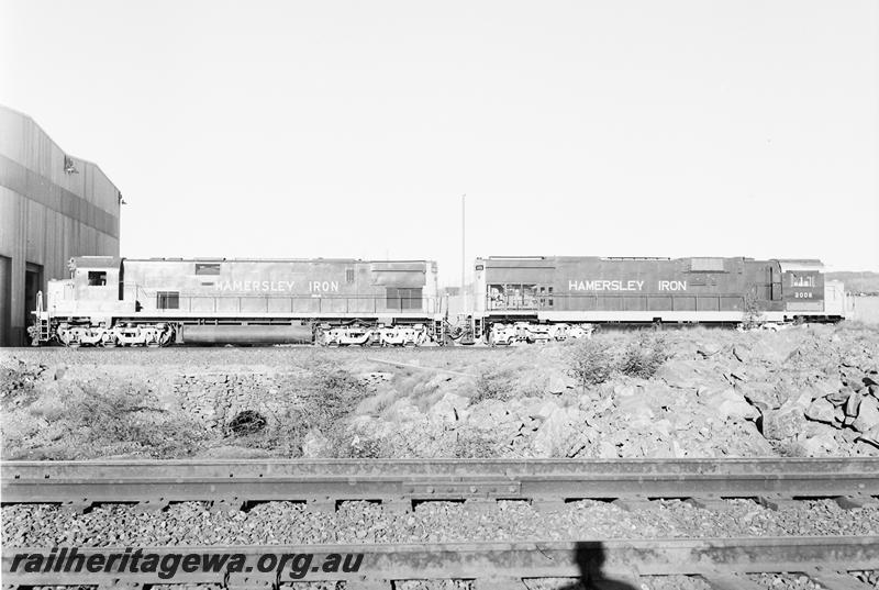 P12683
Dampier, Seven Mile workshop, profile view of Hamersley Iron C628 class 2005 and C636 class 2006
