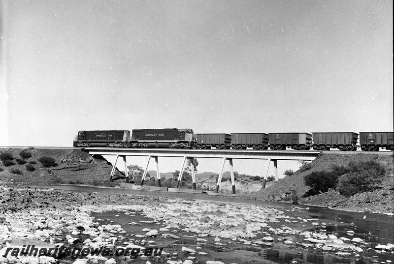 P12684
Hamersley Iron C628 class 2000 and C363 class 2015 with an empty train crossing bridge
