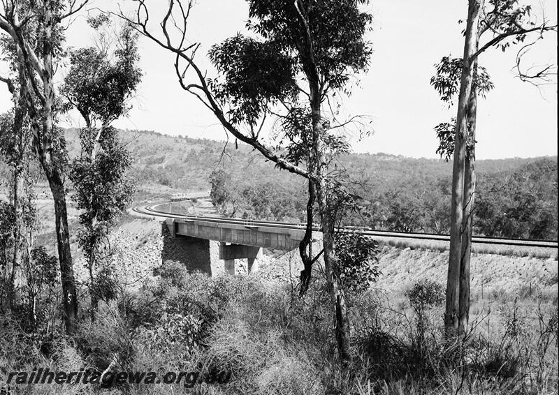 P12695
Concrete girder bridge, Avon Valley line, grain train in the background
