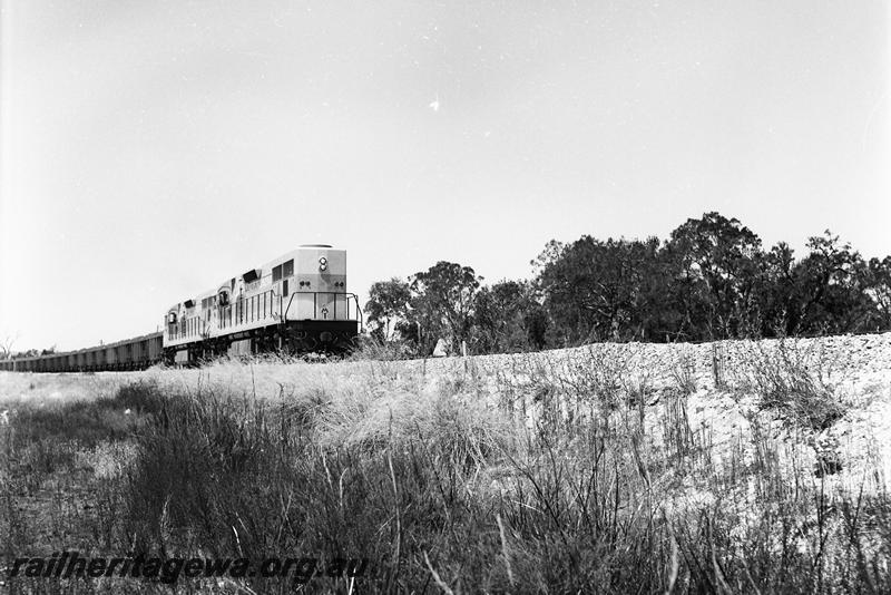 P12712
L class 251 in original livery double heading with another L class, on loaded iron ore train
