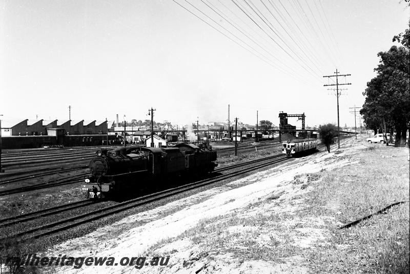 P12736
U class 653 being towed by a D/DM class loco passed the East Perth Loco Depot
