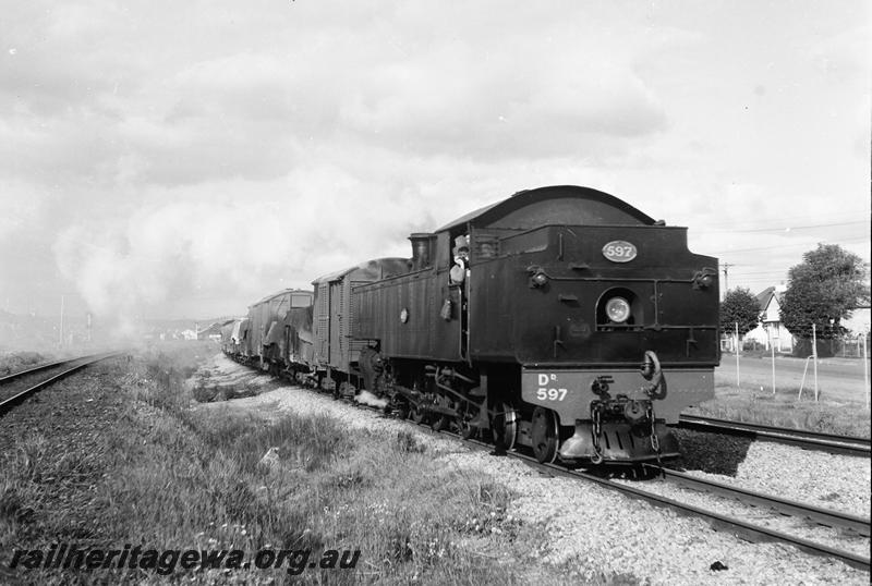 P12737
DD class 597, bunker leading on a Midland to Kewdale goods near West Midland, side and end view.
